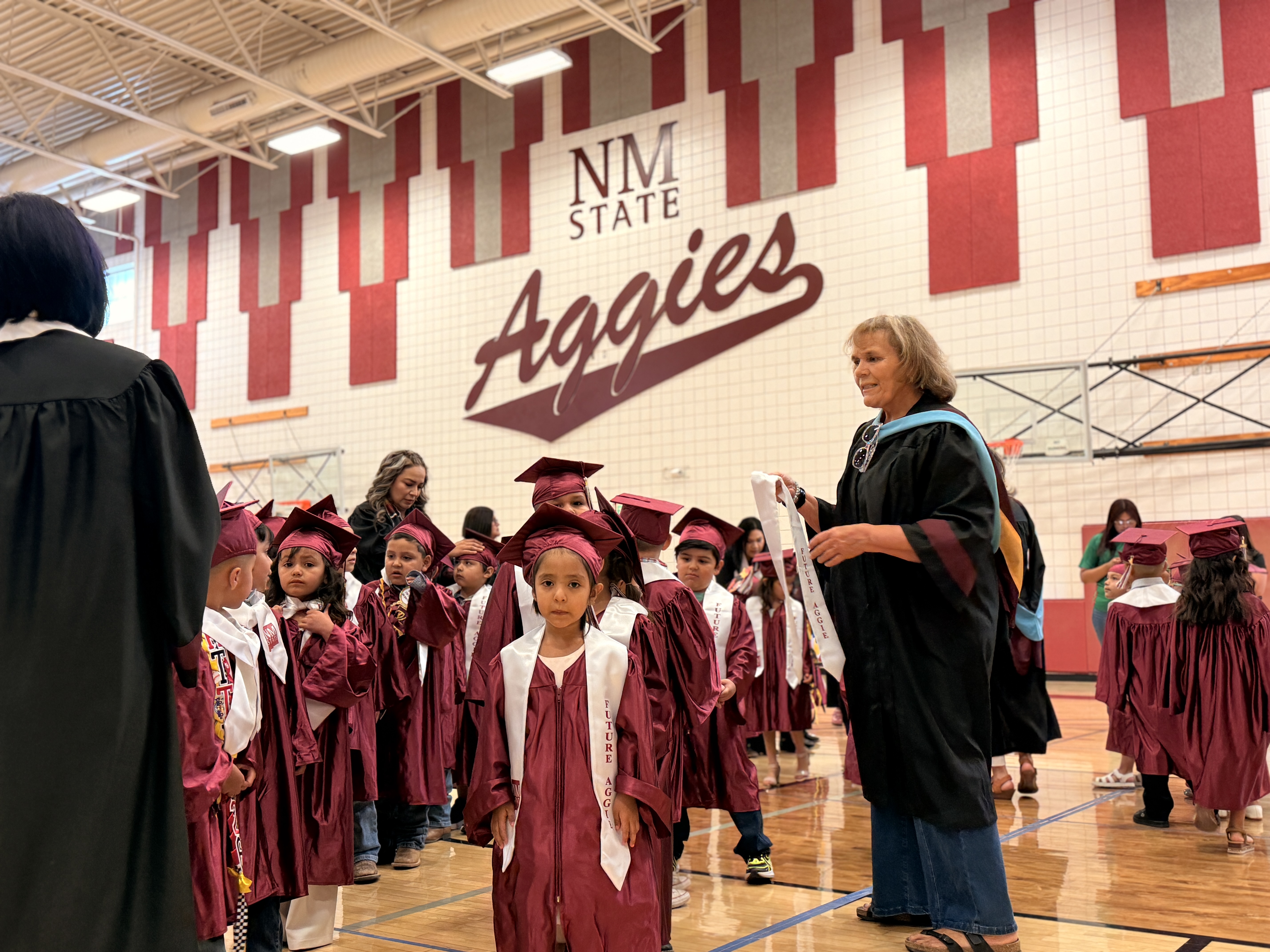 grad with teachers